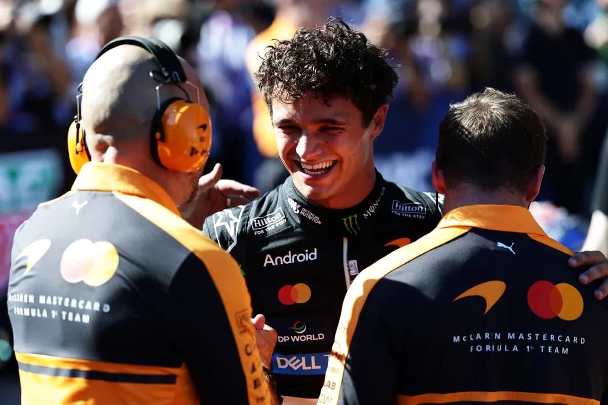 Lando Norris celebrating with McLaren team members Lando Norris celebrating with McLaren team members