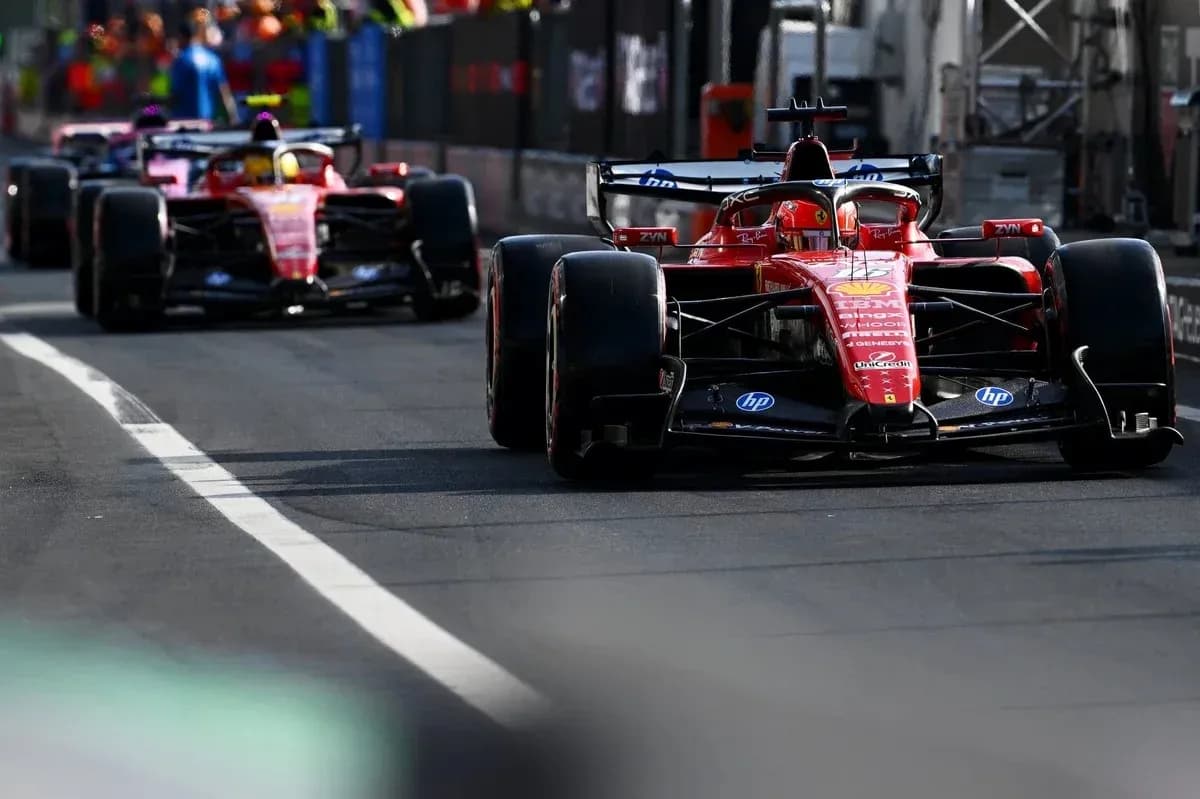 Ferrari cars driving on track during Formula 1 event Ferrari cars driving on track during Formula 1 event