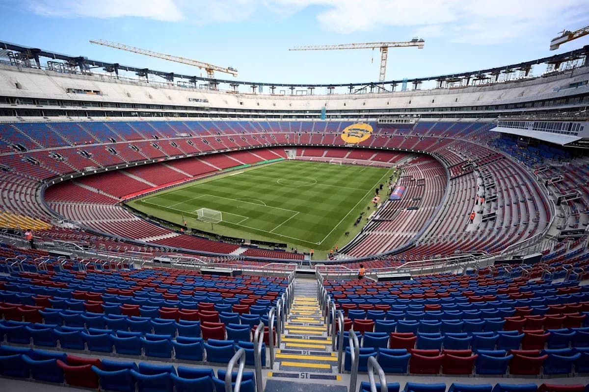 View of empty stadium with pitch under construction View of empty stadium with pitch under construction