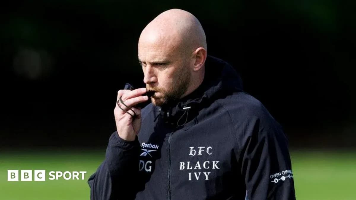 Coach using a whistle during training session Coach using a whistle during training session