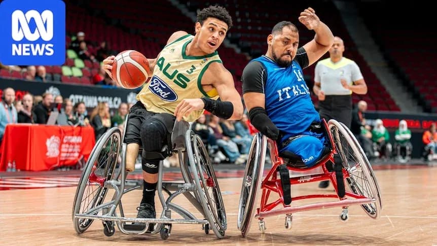 Two players competing in wheelchair basketball match Two players competing in wheelchair basketball match