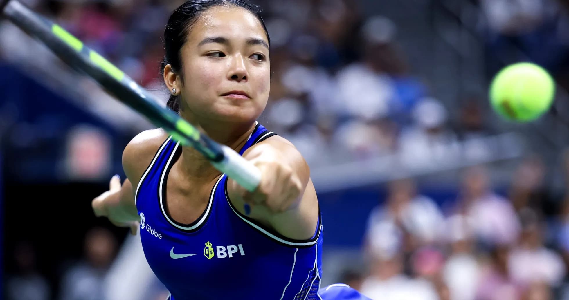 Player hitting a tennis ball during match Player hitting a tennis ball during match