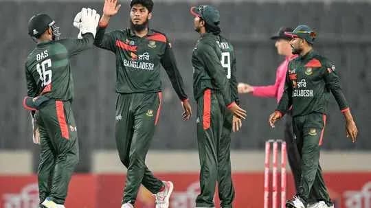 Bangladesh cricket team celebrating a wicket on field Bangladesh cricket team celebrating a wicket on field