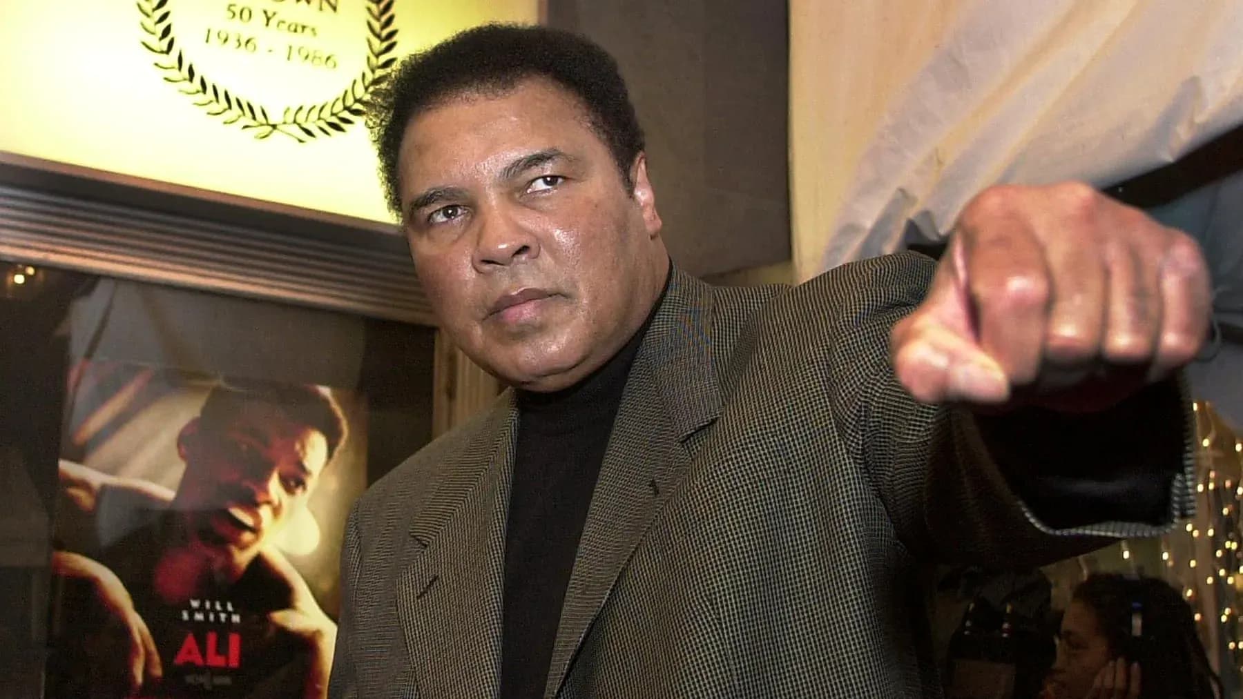 Muhammad Ali posing with a raised fist Muhammad Ali posing with a raised fist