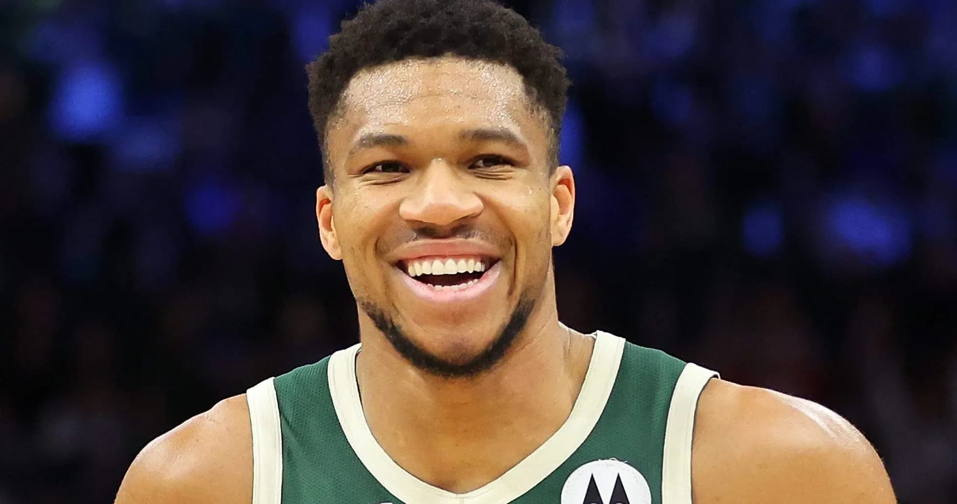 Giannis Antetokounmpo smiling during a game Giannis Antetokounmpo smiling during a game