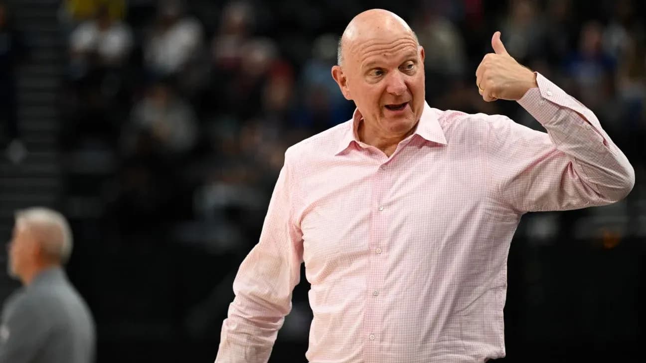 Man in pink shirt gesturing during basketball game Man in pink shirt gesturing during basketball game