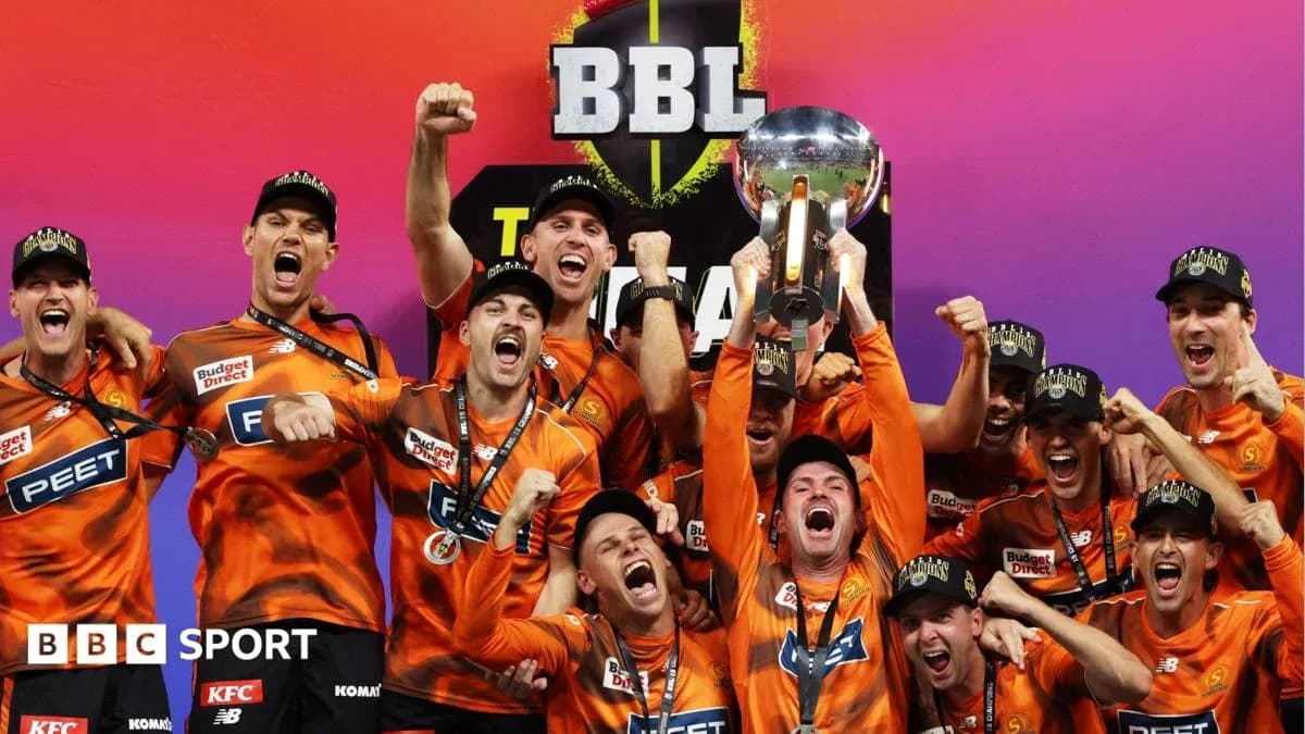 Team celebrating victory with trophy at BBL final Team celebrating victory with trophy at BBL final