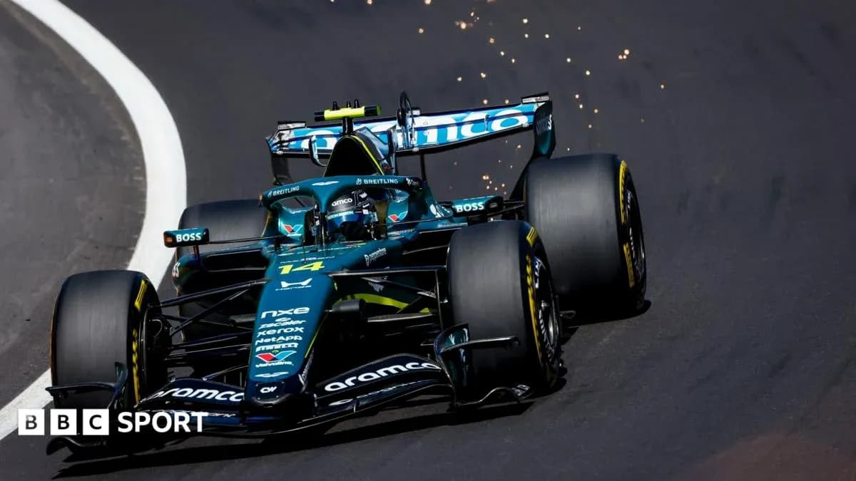Formula 1 car racing on track with sparks flying Formula 1 car racing on track with sparks flying