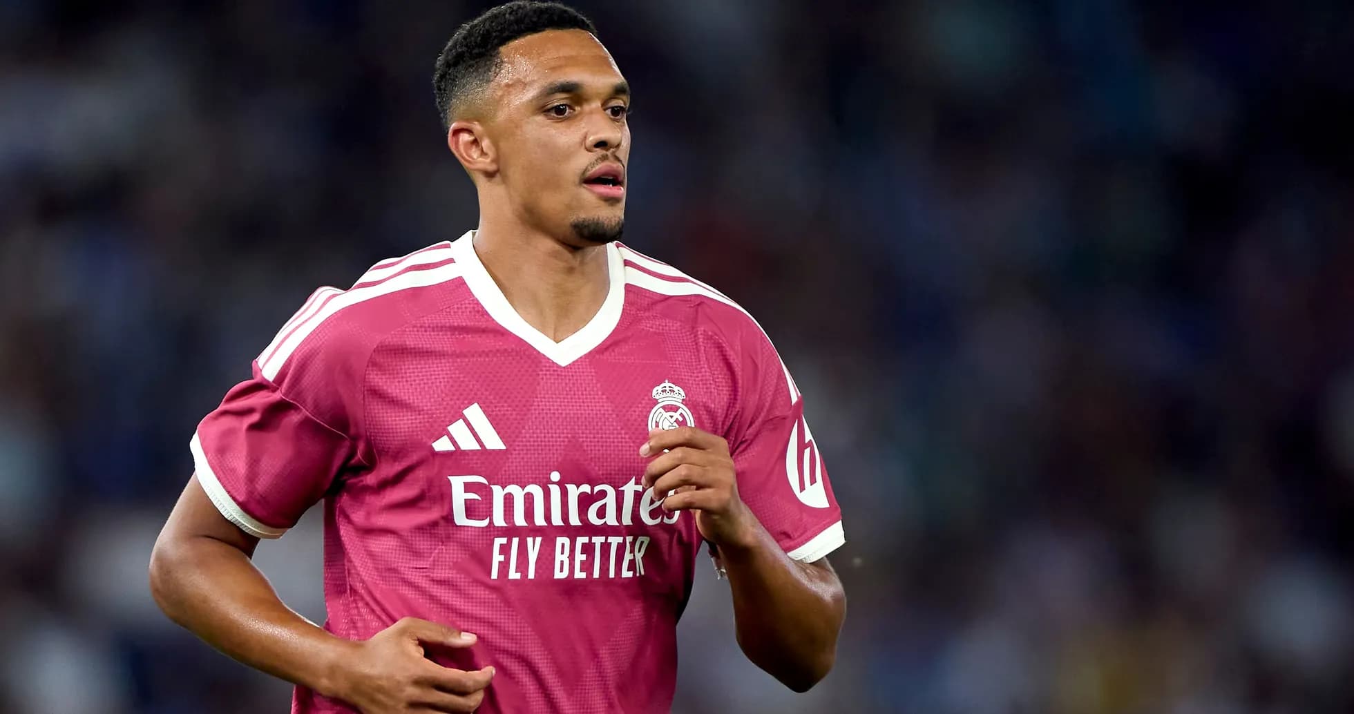 Player wearing pink Real Madrid jersey during match Player wearing pink Real Madrid jersey during match