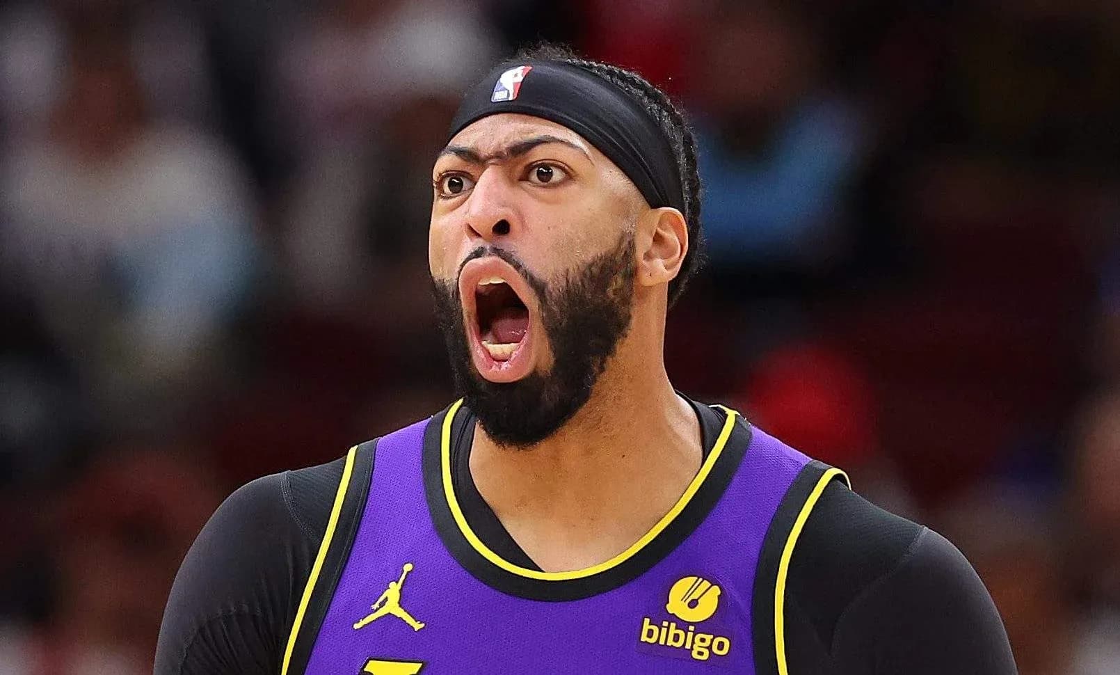 Player celebrating during a basketball game Player celebrating during a basketball game