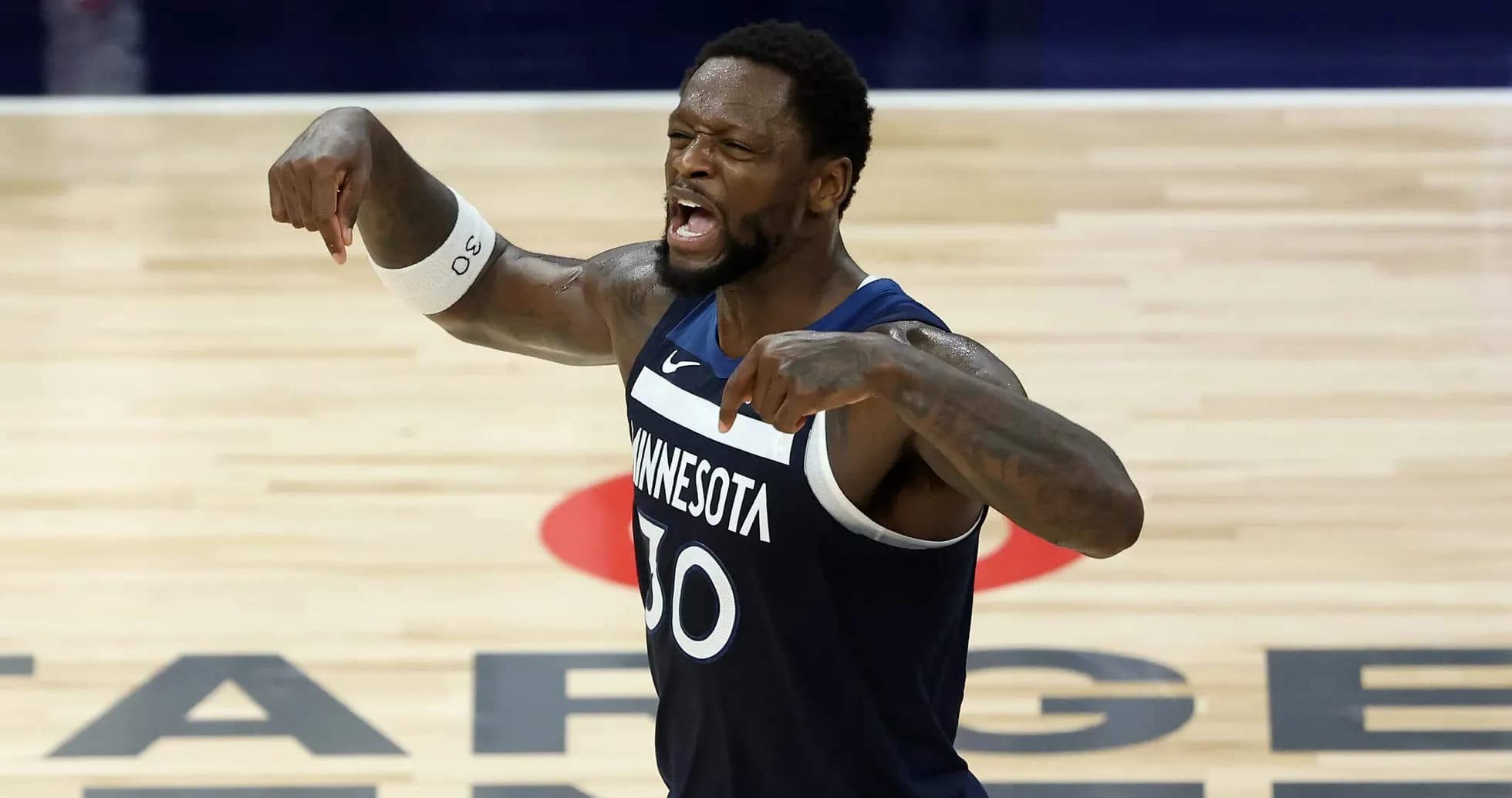 Player celebrating during a basketball game at Target Center Player celebrating during a basketball game at Target Center