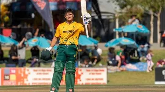 Batter celebrating a milestone during cricket match Batter celebrating a milestone during cricket match