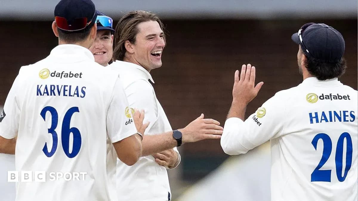 Cricket players celebrating a wicket on field Cricket players celebrating a wicket on field