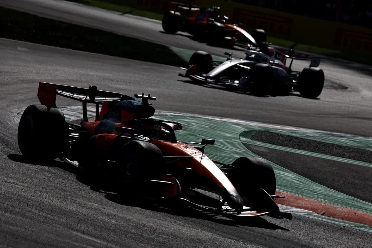 Formula 1 cars racing on track during event Formula 1 cars racing on track during event