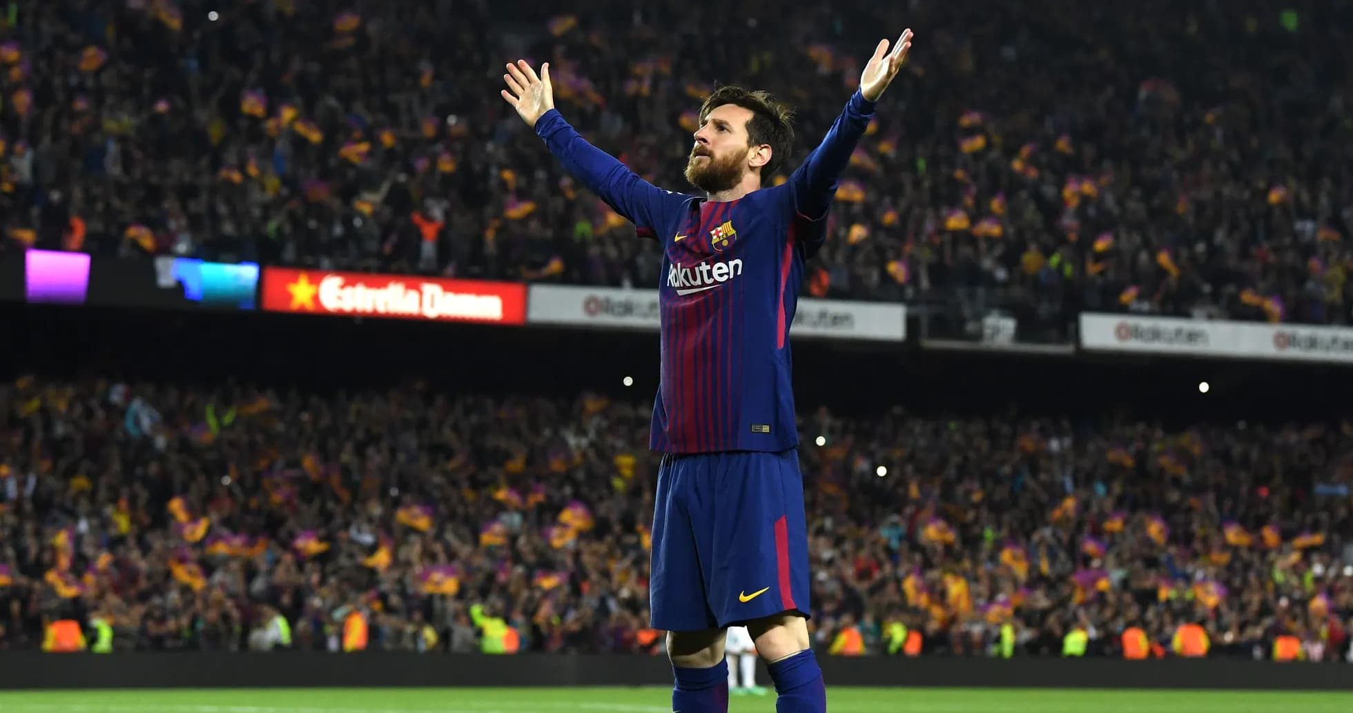 Player celebrating in front of cheering crowd Player celebrating in front of cheering crowd