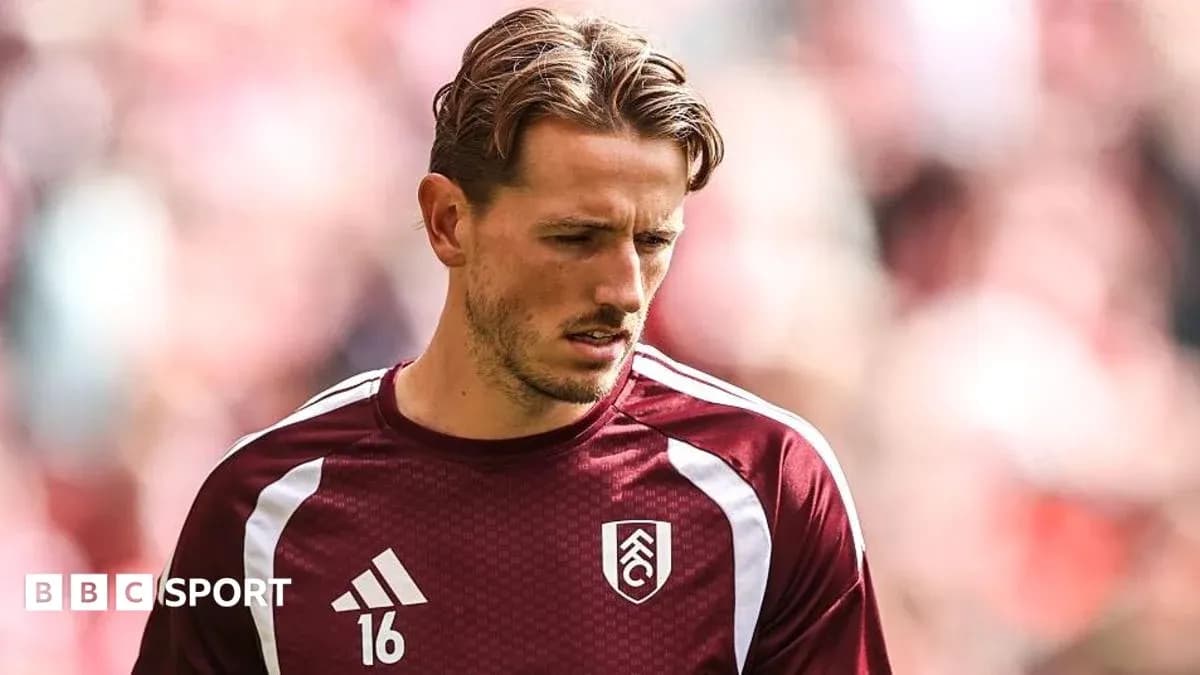 Player in Fulham training kit during warm-up Player in Fulham training kit during warm-up