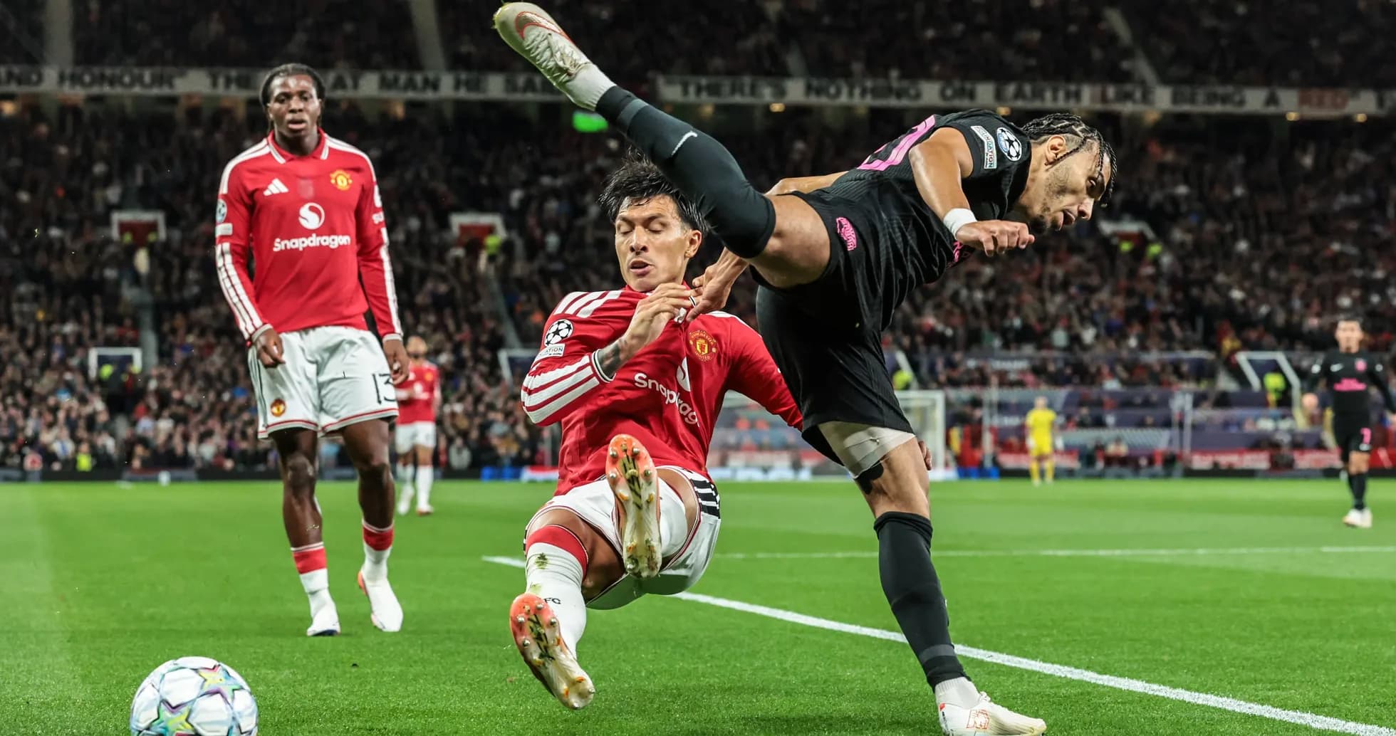 Player tackling opponent near corner flag during match Player tackling opponent near corner flag during match