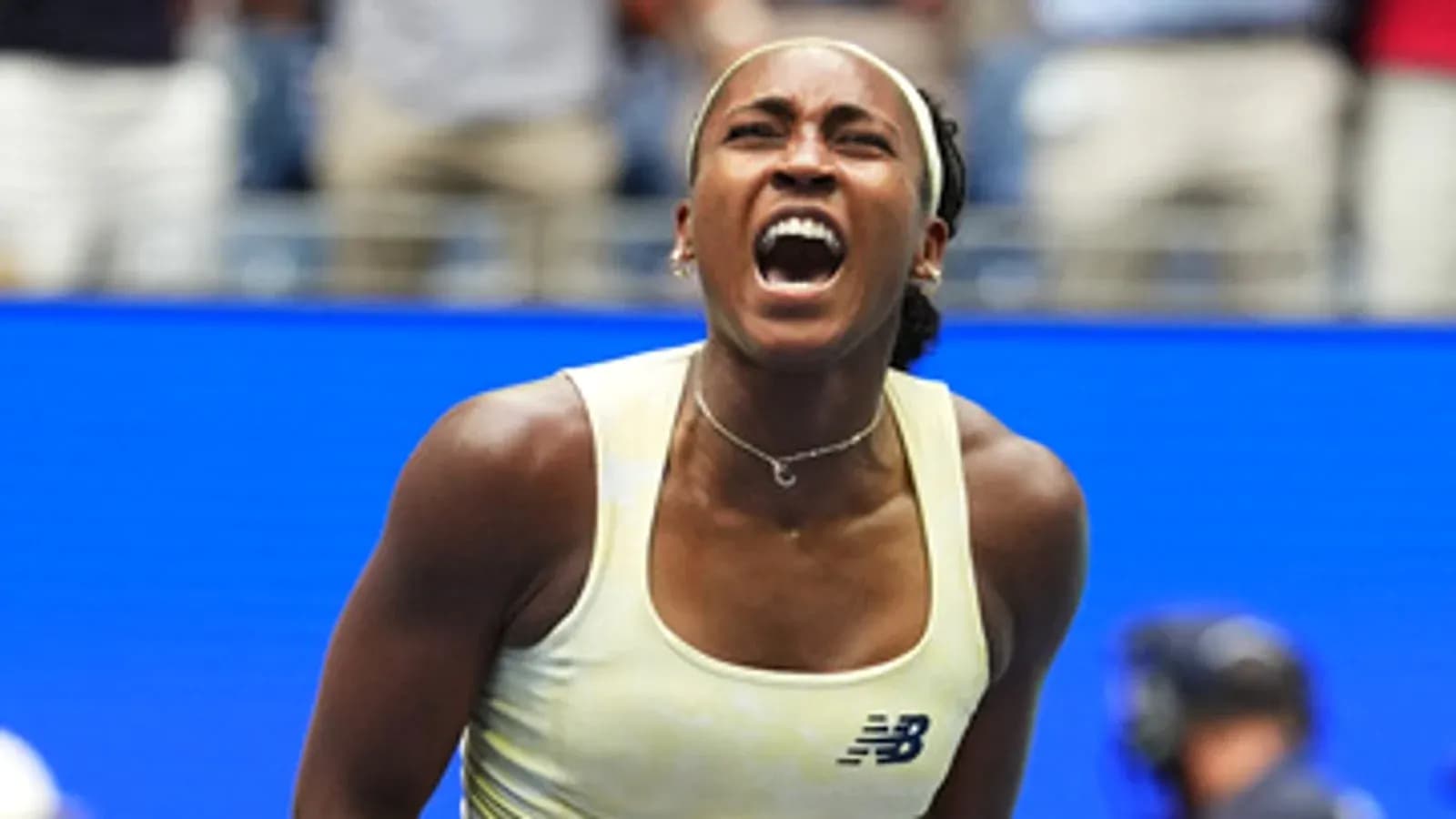Tennis player celebrating after winning a point Tennis player celebrating after winning a point