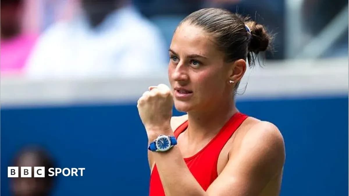 Tennis player celebrating during a match Tennis player celebrating during a match