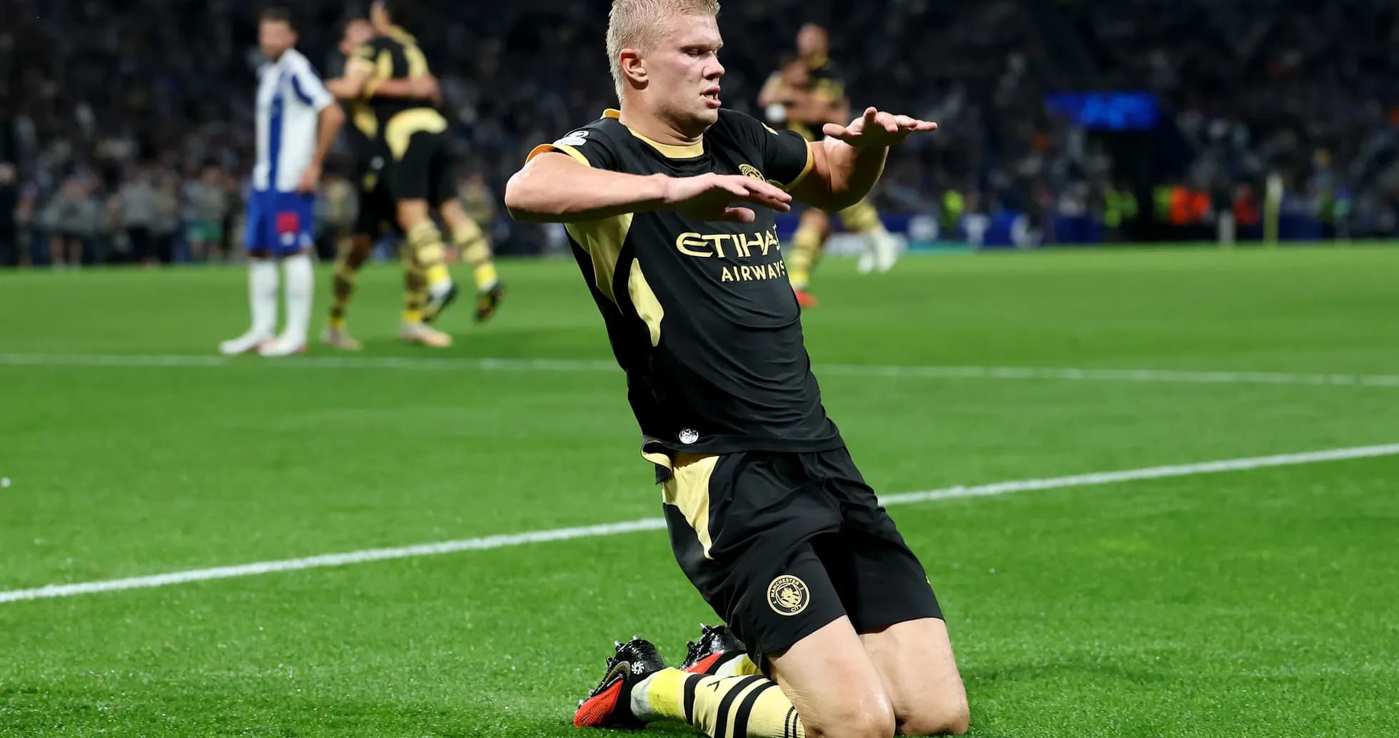 Player celebrating on the pitch after scoring goal Player celebrating on the pitch after scoring goal
