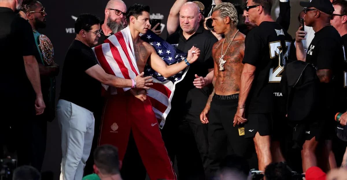 Two fighters facing off at weigh-in event Two fighters facing off at weigh-in event